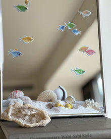 Ocean fish mirror wall art with marine-inspired fish and shell motifs