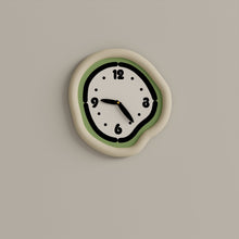 Cream minimalist wall clock with pendulum for modern home decor