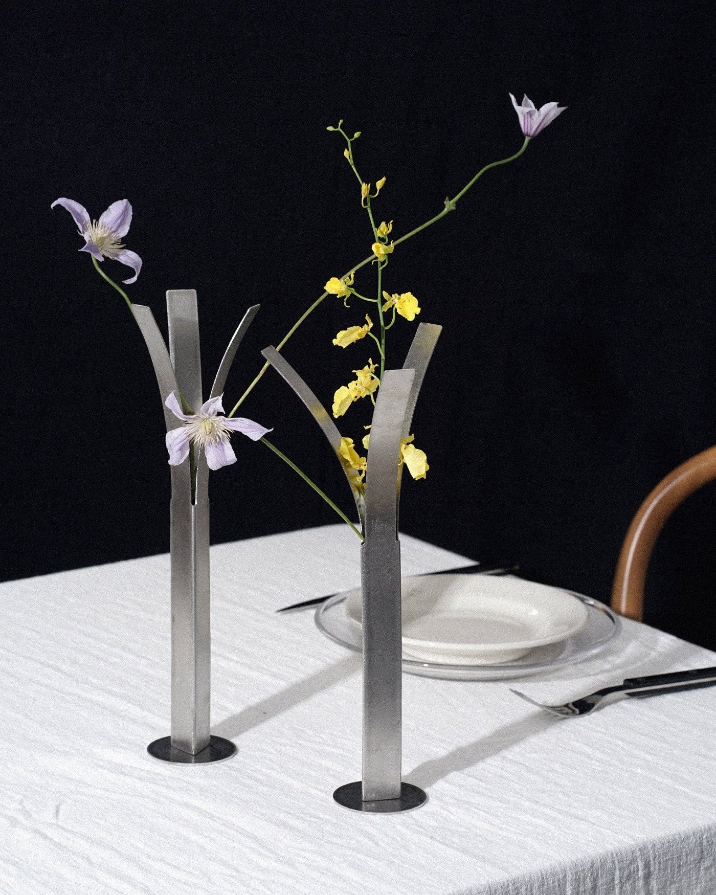 Minimalist stainless steel bud vase for modern tabletop decor