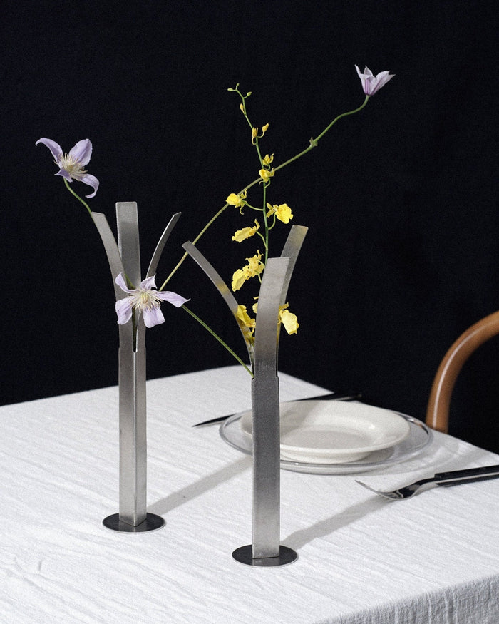 Minimalist stainless steel bud vase for modern tabletop decor