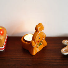 Ceramic Christmas candle holder with festive holiday design