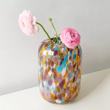 Colorful polka dot glass vase with cylindrical shape
