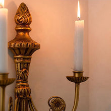 Vintage French-style iron wall candle holder with ornate detailing