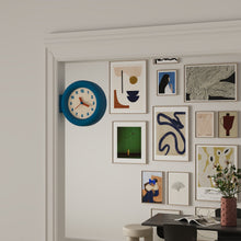 Double-sided round wall clock with bracket-mounted retro design