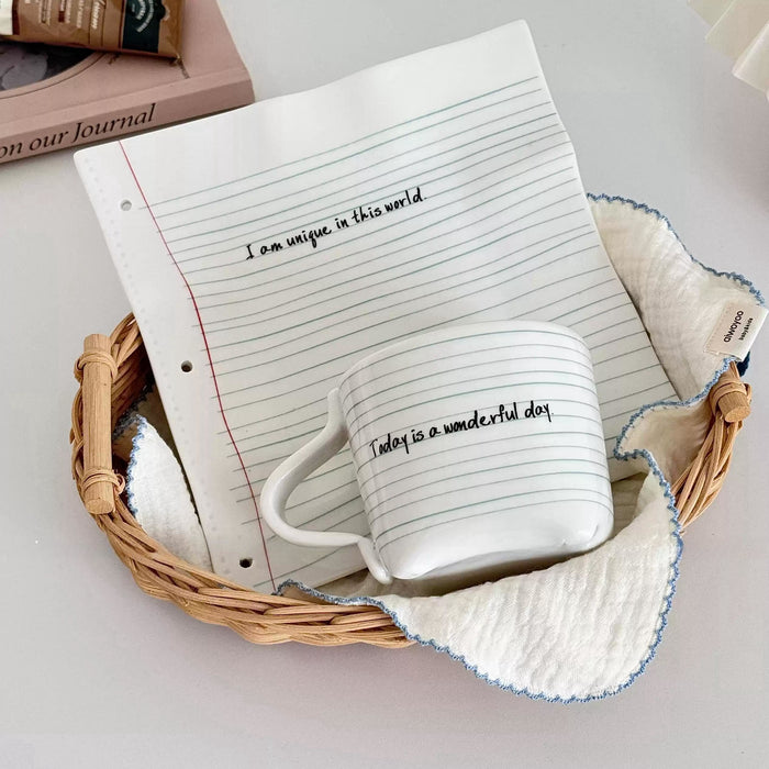 Notebook-inspired ceramic coffee cup with matching tray