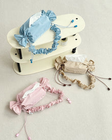 Baby blue candy-shaped nylon tissue holder bag with drawstring design