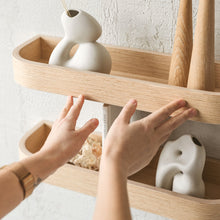 Set of two natural oak floating wall shelves for minimalist home storage and display