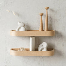 Set of two natural oak floating wall shelves for minimalist home storage and display