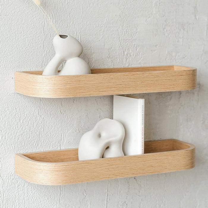 Set of two natural oak floating wall shelves for minimalist home storage and display