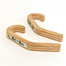 Set of two minimalist wooden wall hooks for coats and home storage
