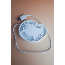 White lying charging dock for Gondosóra magnetic charging cable