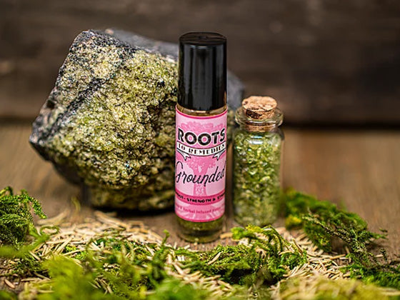 Grounded crystal and herbal infused aromatherapy roller with peridot