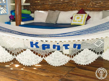 Knossos blue and white cotton L-bar hammock with wooden spreader bars