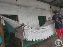 Hand-woven Deluxe Masaya cotton spreader bar hammock with decorative fringe and wooden bars