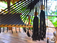 Black cotton L-bar hammock with wooden spreader bars