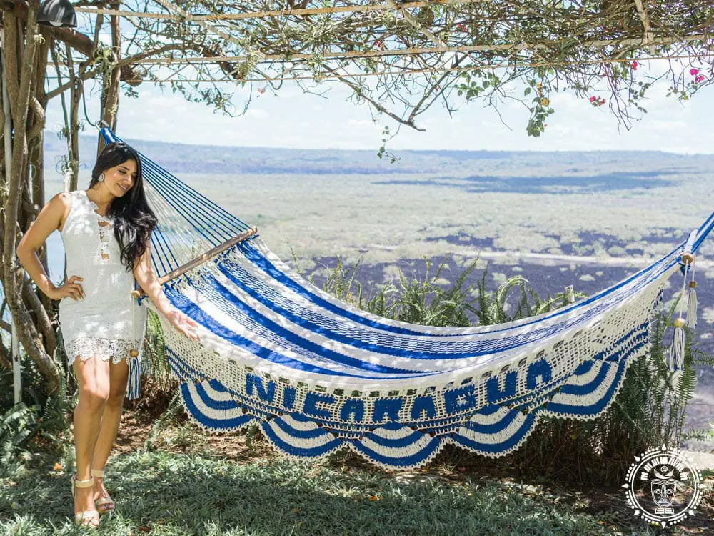 Nicaragua L-bar cotton hammock in blue and white with wooden spreader bars