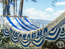 Nicaragua L-bar cotton hammock in blue and white with wooden spreader bars