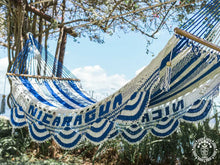 Nicaragua L-bar cotton hammock in blue and white with wooden spreader bars