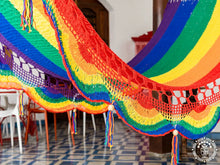 Pride coloured cotton spreader bar hammock handmade in Nicaragua