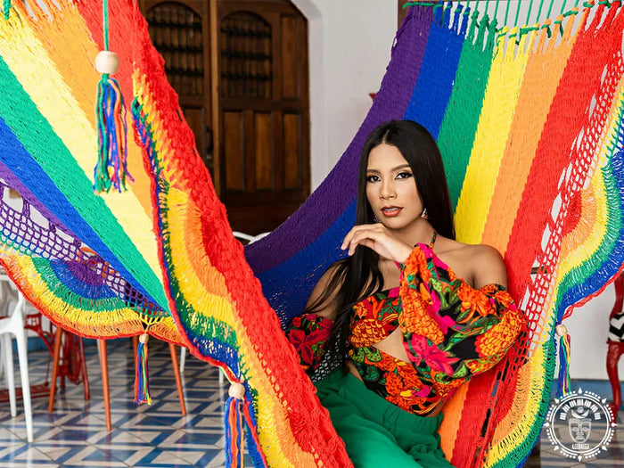 Pride coloured cotton spreader bar hammock handmade in Nicaragua