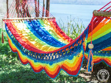 Rivas 2 multicolour cotton bar hammock with wooden spreader bars and decorative fringes