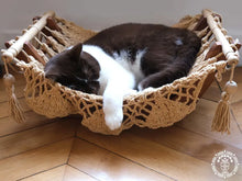 Taupe cat hammock with wooden stand for a cosy raised pet bed