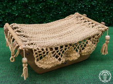 Taupe cat hammock with wooden stand for a cosy raised pet bed