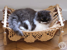 Taupe cat hammock with wooden stand for a cosy raised pet bed