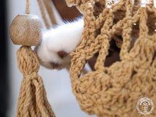 Taupe cat hammock with wooden stand for a cosy raised pet bed
