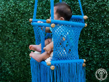Blue hand-woven macramé baby hammock chair made from cotton