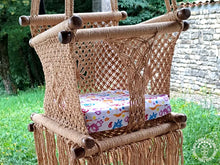 Taupe macramé baby hammock chair made from cotton with wooden fastenings