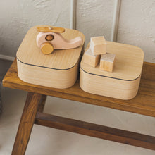 Set of two natural oak wooden storage boxes with lids for home organisation