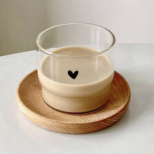 Cute face glass coffee cup with playful design