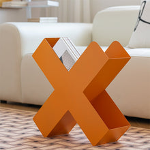 Orange X-shaped metal bookshelf for books, magazines, and home decor