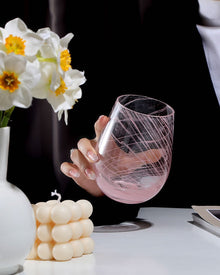 Starry pink glass cup with decorative star pattern