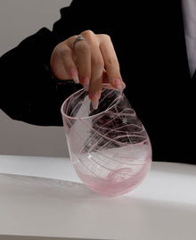 Starry pink glass cup with decorative star pattern