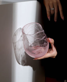 Starry pink glass cup with decorative star pattern
