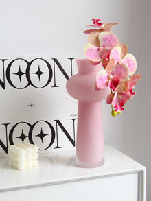 Pink tall glass flower vase with shiny finish for home decor