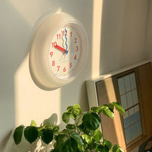 Modern yellow plastic wall clock for home decor