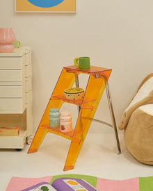 Grey foldable acrylic and metal ladder side table for small spaces