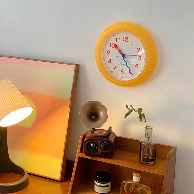 Modern yellow plastic wall clock for home decor