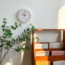 Modern yellow plastic wall clock for home decor