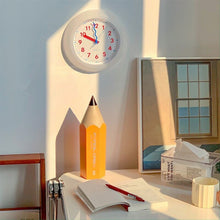 Modern yellow plastic wall clock for home decor