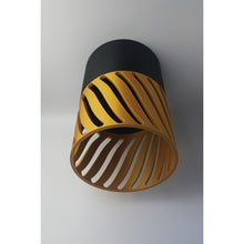 Sylwave Onyx Dune 3D printed pendant light with black top and golden yellow spiral shade