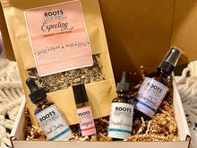 Pregnancy wellness gift set with herbal tea, extracts, roller, and magnesium spray