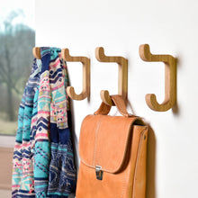 Set of two oak wooden wall hooks for coats, bags, keys, and home organization