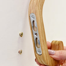 Set of two minimalist wooden wall hooks for coats and home storage