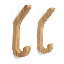 Set of two minimalist wooden wall hooks for coats and home storage