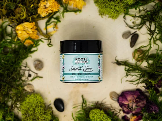 Smooth Skin herbal salve in a 2 oz amber jar