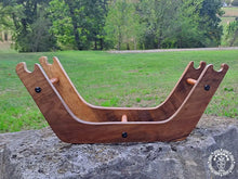 Taupe cat hammock with wooden stand for a cosy raised pet bed